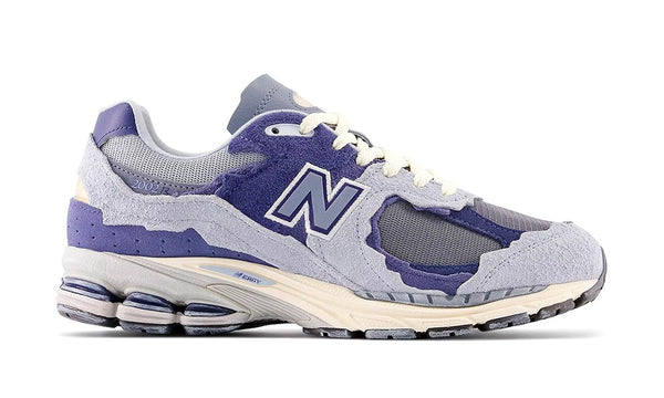 New balance best sale 410 kinderen purper